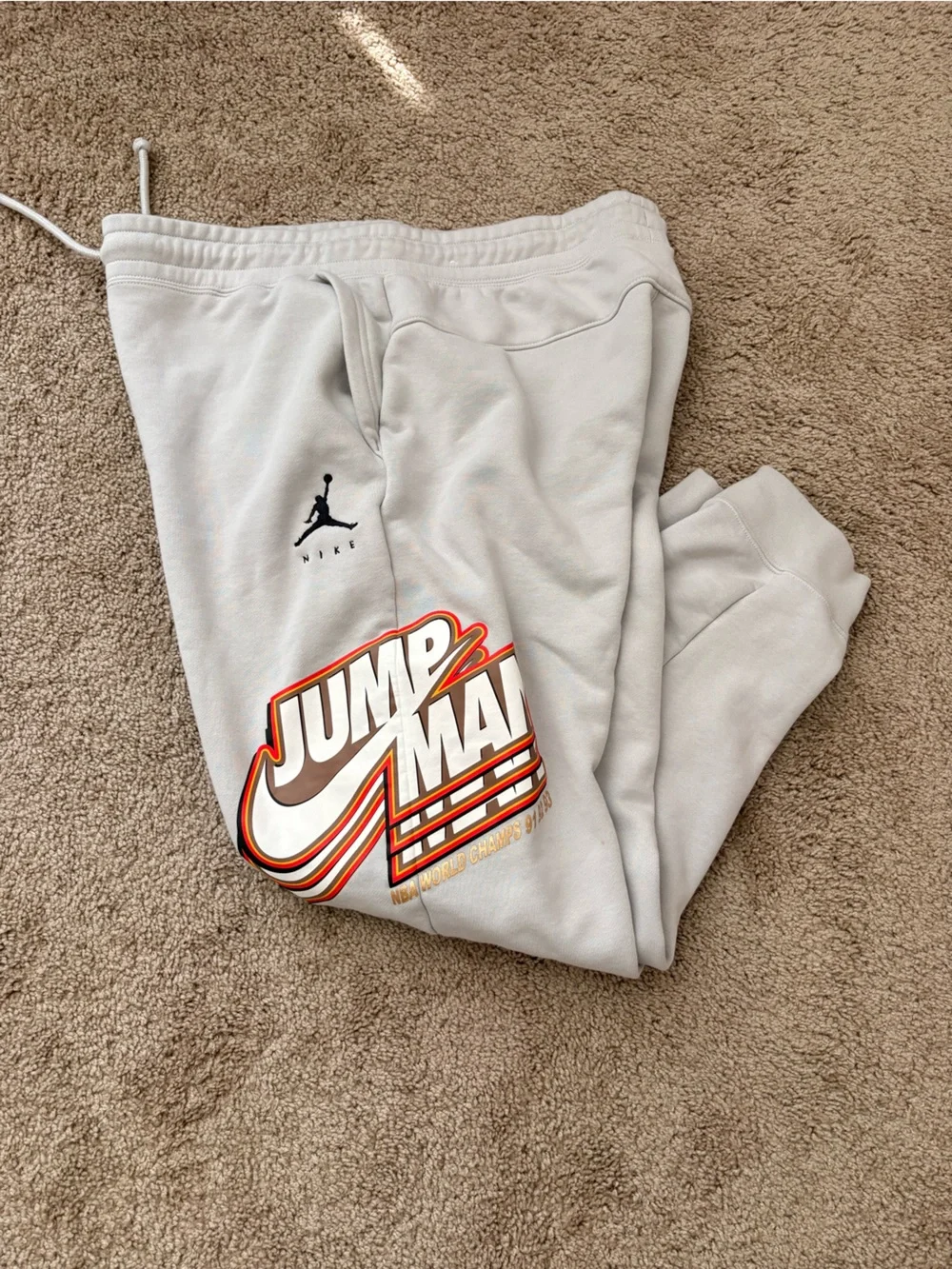 Jordan Sweatpants with Orange & Black Graphic